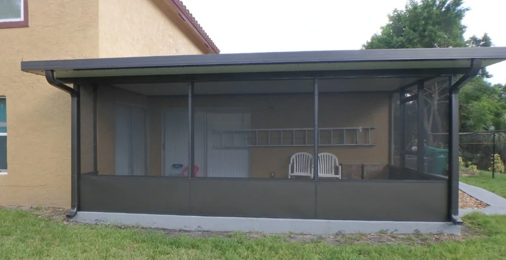 Custom screen room attached to a Gulf Coast home